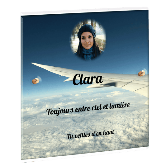 Plaque funéraire - Aile d'avion au dessus des nuages